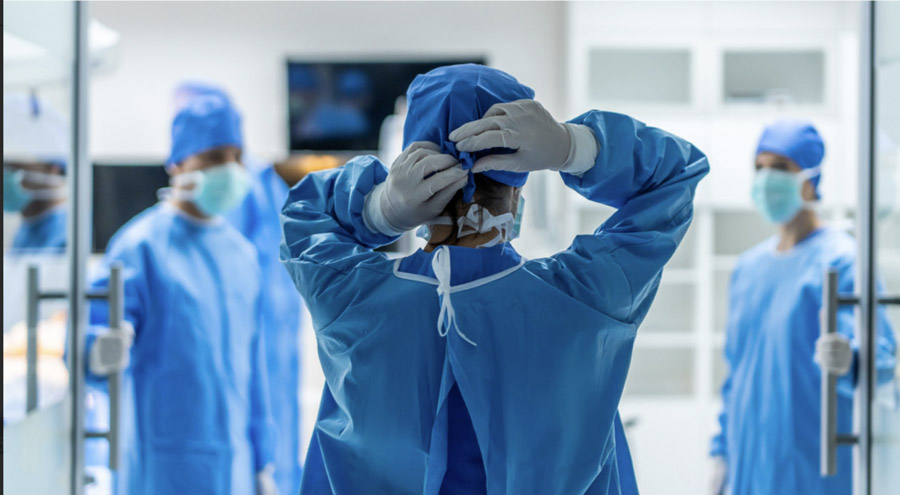 Doctor with doors open leaving